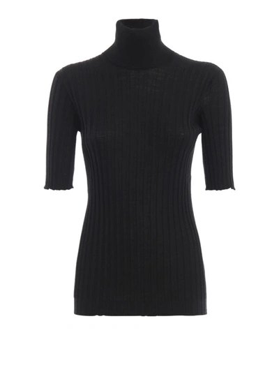 Shop Bottega Veneta Ribbed Wool Turtleneck Sweater In Black