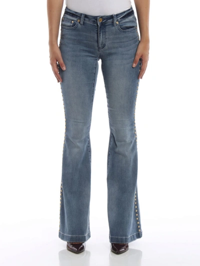 Shop Michael Kors Selma Stud Embellished Flared Jeans In Light Wash