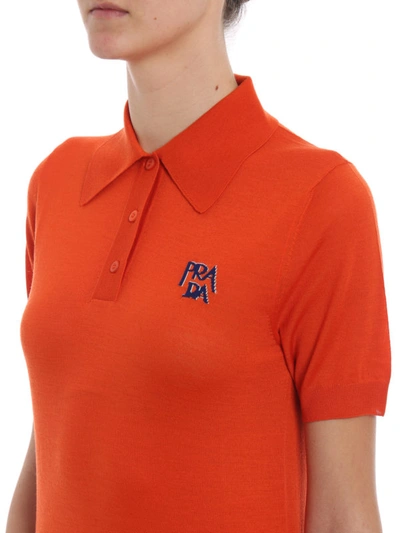 Shop Prada Logo Intarsia Orange  Knit Wool Polo Shirt