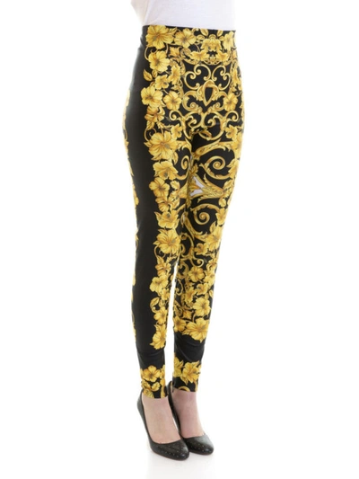 Shop Versace Gold Hibiscus Print Leggings