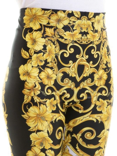 Shop Versace Gold Hibiscus Print Leggings