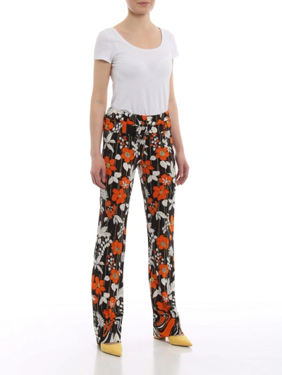Shop Prada Floral Viscose Flared Pants In Orange