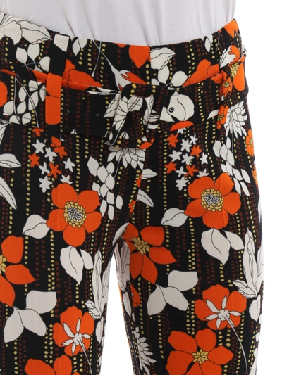 Shop Prada Floral Viscose Flared Pants In Orange