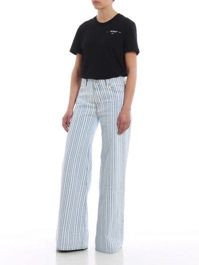 Shop Off-white Striped Denim Flared Jeans In Light Wash