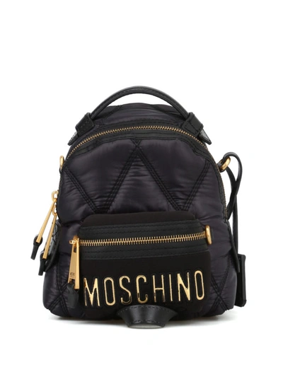 Shop Moschino Logo Lettering Quilted Backpack In Black