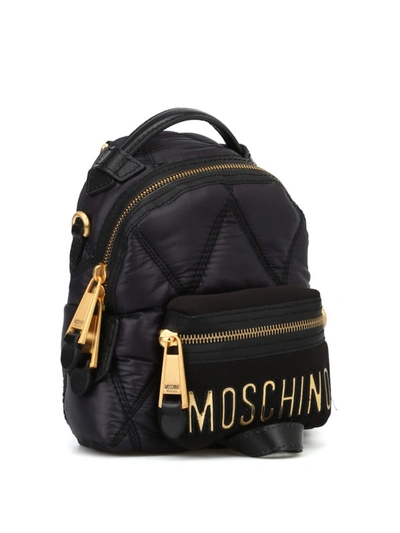 Shop Moschino Logo Lettering Quilted Backpack In Black