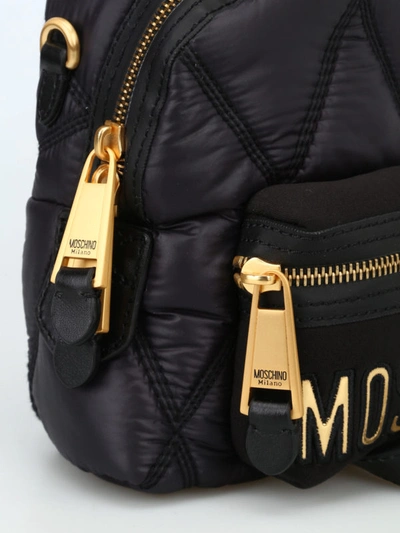 Shop Moschino Logo Lettering Quilted Backpack In Black
