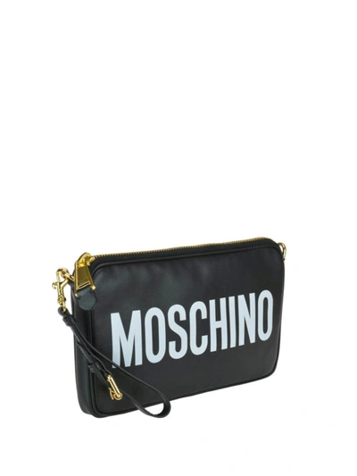 Shop Moschino Logo Print Leather Cross Body Bag In Black