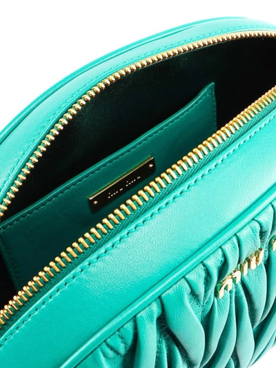 Shop Miu Miu Matelasse Leather Small Cross Body Bag In Green