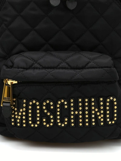 Shop Moschino Studded Logo Lettering Backpack In Black