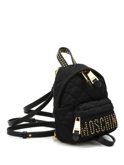 Shop Moschino Studded Logo Lettering Backpack In Black