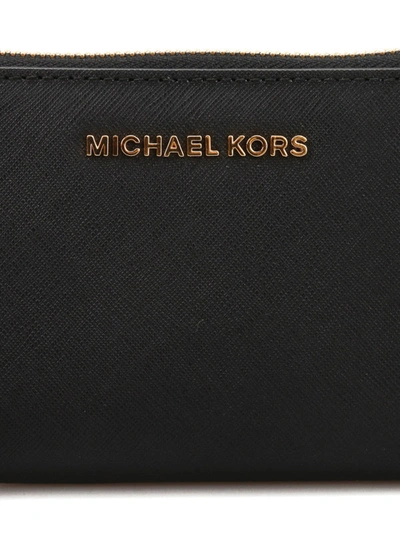 Shop Michael Kors Jet Set Travel Wallet In Black