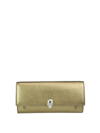 Shop Alexander Mcqueen Gold-tone Metallic Leather Skull Wallet Bag