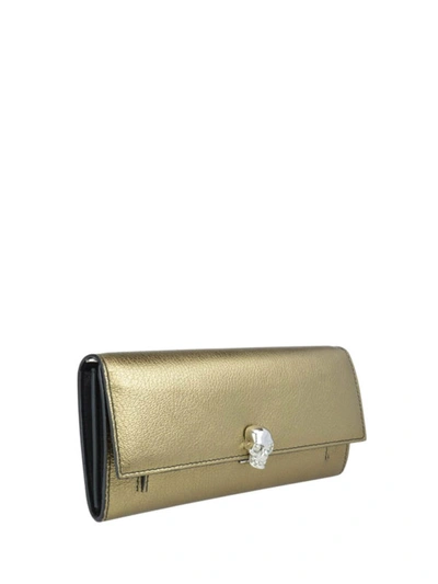 Shop Alexander Mcqueen Gold-tone Metallic Leather Skull Wallet Bag