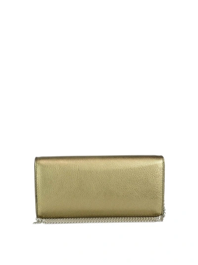 Shop Alexander Mcqueen Gold-tone Metallic Leather Skull Wallet Bag