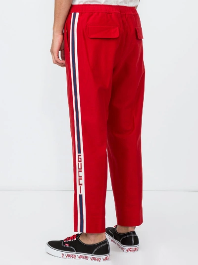 Shop Gucci Side Stripe Joggers In Red