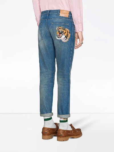 Shop Gucci Denim Tapered Pant With Emrboidered Tiger In Blue