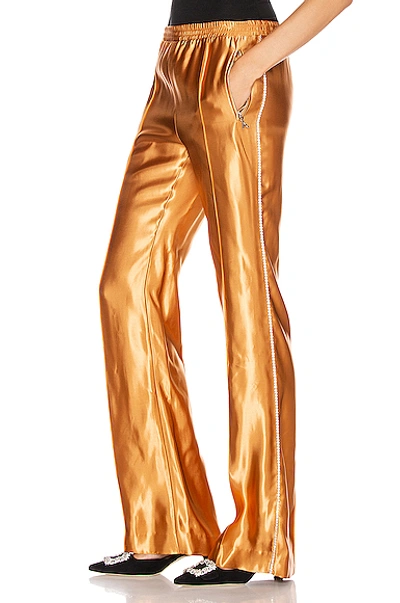 Shop Area Liquid Satin Crystal Stripe Track Pant In Toffee