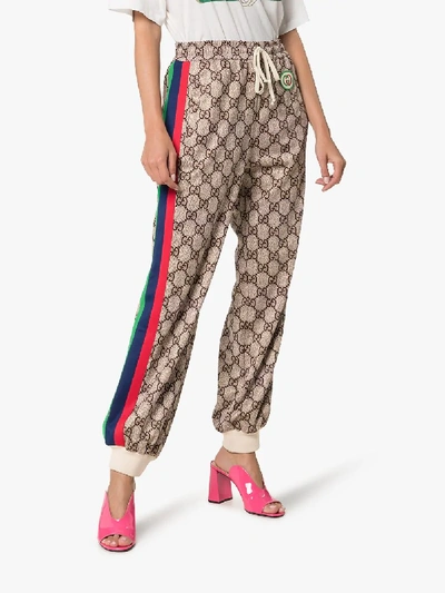 Shop Gucci Gg Supreme Print Jogging Pants In Neutrals