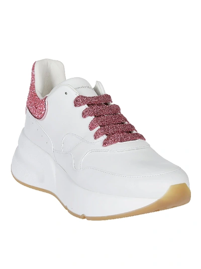 Shop Alexander Mcqueen Oversized Runner Sneakers In White Pink