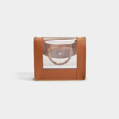 Shop Loeffler Randall Marla Crossbody Square Bag With Chain In Brown Smooth Leather And Clear Pvc