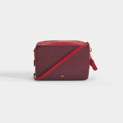 Shop Anya Hindmarch Scoop Double Zip Wallet On Strap In Burgundy Grained Leather