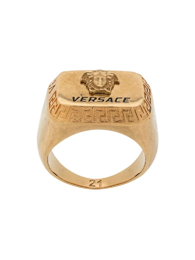 Shop Versace Engraved Logo Rectangle Ring In Gold