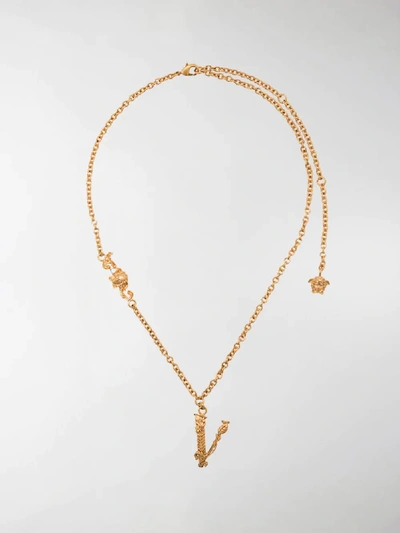Shop Versace Barocco Letter Necklace In Gold