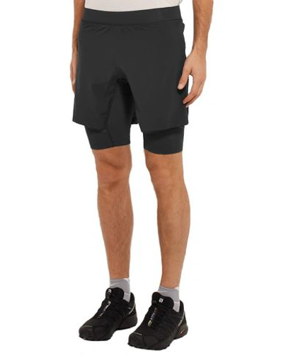 Shop Salomon Shorts & Bermuda In Black