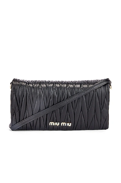 Shop Miu Miu Quilted Crossbody Bag In Black