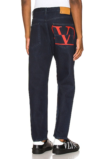 Shop Valentino 5 Pocket Denim Jeans In Denim Dark In Navy & Red