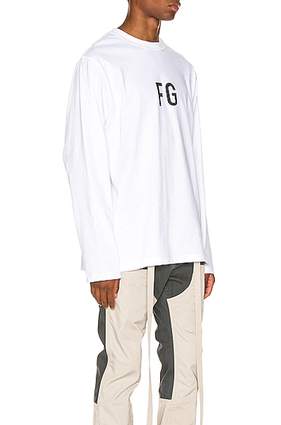 Shop Fear Of God Long Sleeve Fg Tee In White