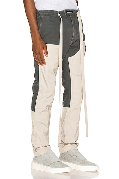 Shop Fear Of God Nylon Canvas Double Front Work Pants In Seaweed & Bone