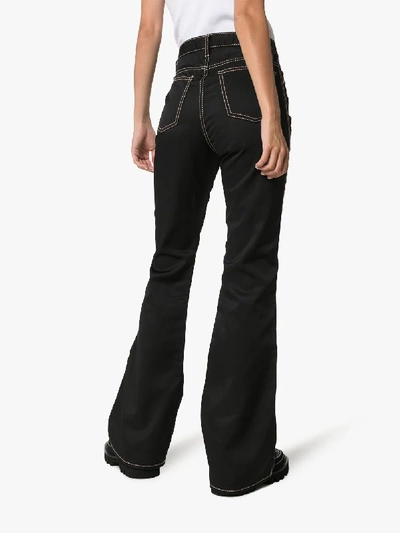 Shop Eytys Oregon Flared Jeans In Black