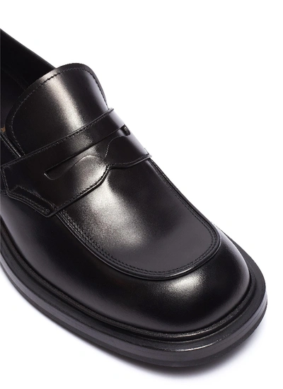 Shop Prada Leather Penny Loafers