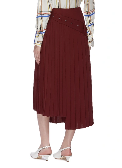 Shop Akira Naka Belted Pleated Staggered Hem Skirt