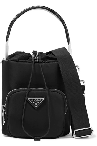 Shop Prada Leather-trimmed Shell Bucket Bag In Black