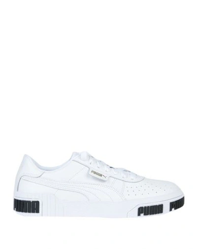 Shop Puma Sneakers In White