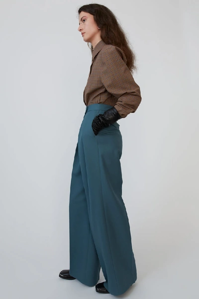 Shop Acne Studios Double Pleated Trousers Mineral Blue
