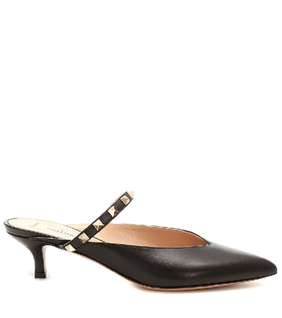 Shop Valentino Rockstud Leather Mules In Black