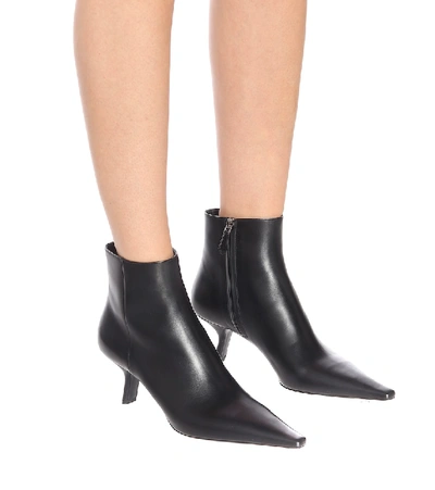 Shop Prada Leather Ankle Boots In Black