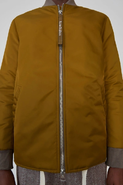 Shop Acne Studios Nylon Jacket Oil Yellow