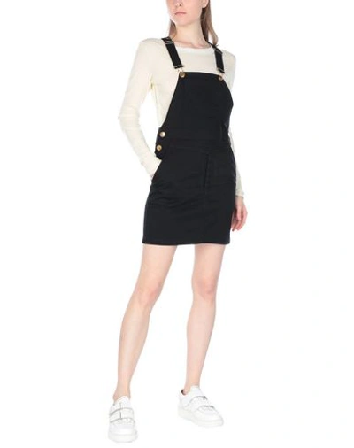 Shop Boutique Moschino Overalls In Black