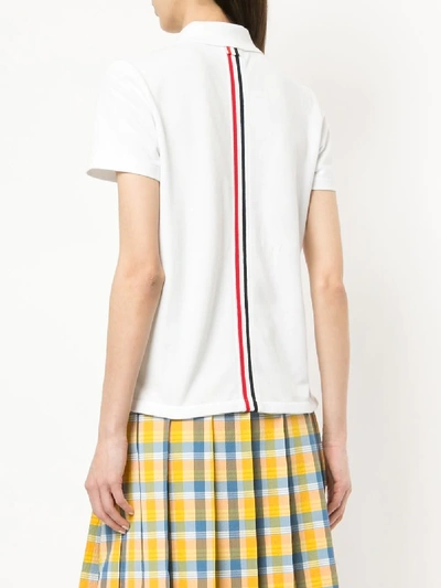 THOM BROWNE RELAXED FIT SHORT SLEEVE POLO WITH CENTER BACK RED, WHITE AND BLUE STRIPE IN CLASSIC PIQ