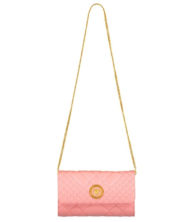 Shop Versace Quilted Chain Wallet In Pink