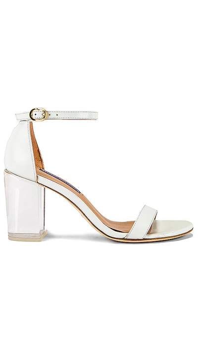 Shop Stuart Weitzman Nearly Nude Lucite Sandal In White