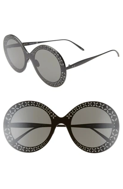 Shop Alaïa Round Sunglasses In Black
