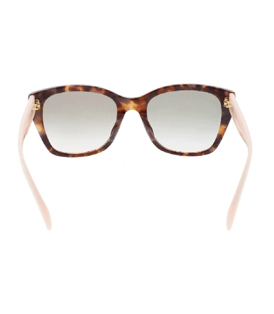 Shop Prada Heritage Spotted Sunglasses In Brown