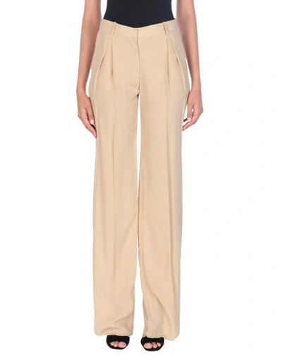 Shop Versace Casual Pants In Sand