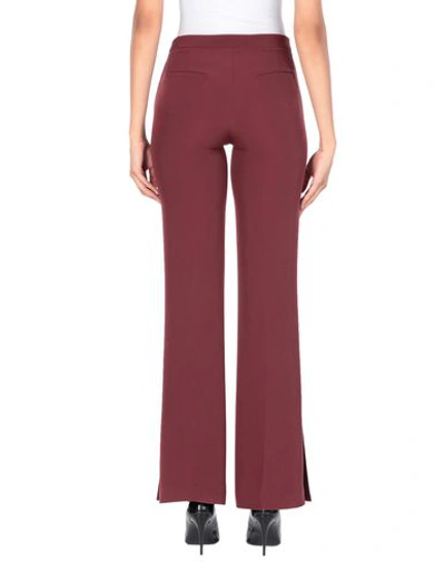 Shop Beatrice B Casual Pants In Maroon